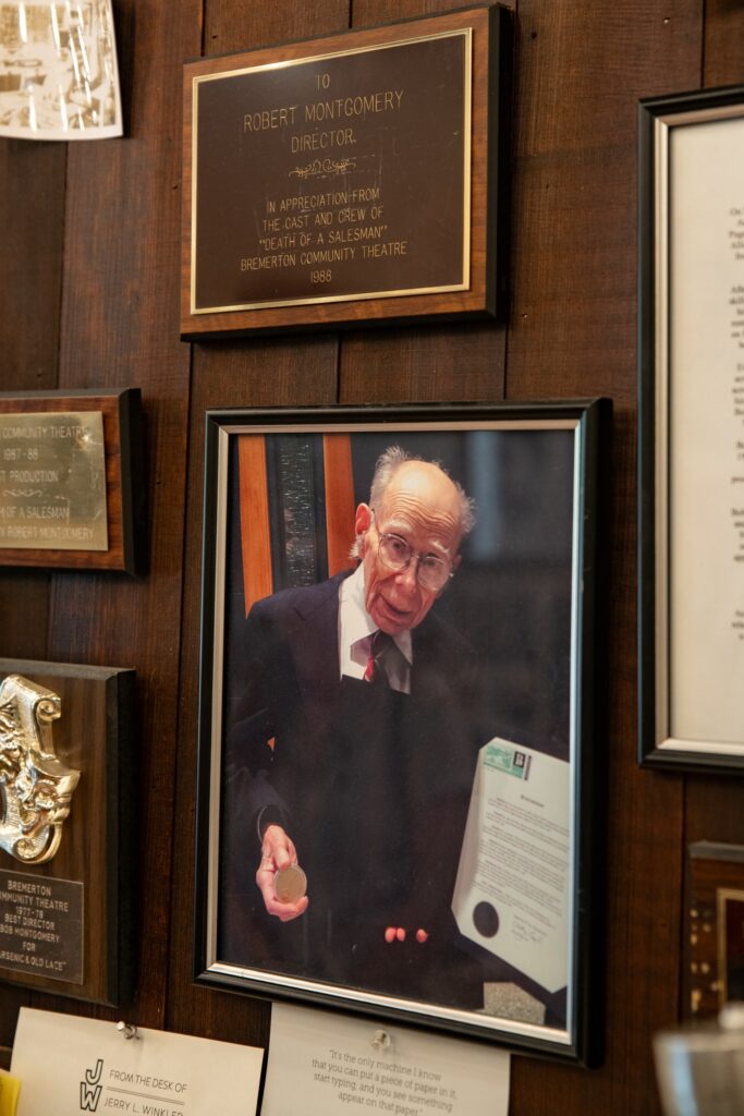 A portrait of longtime typewriter repairman Bob Montgomery hangs inside Bremerton Typewriter Co. Montgomery mentored Paul Lundy before Lundy purchased the business in 2014.