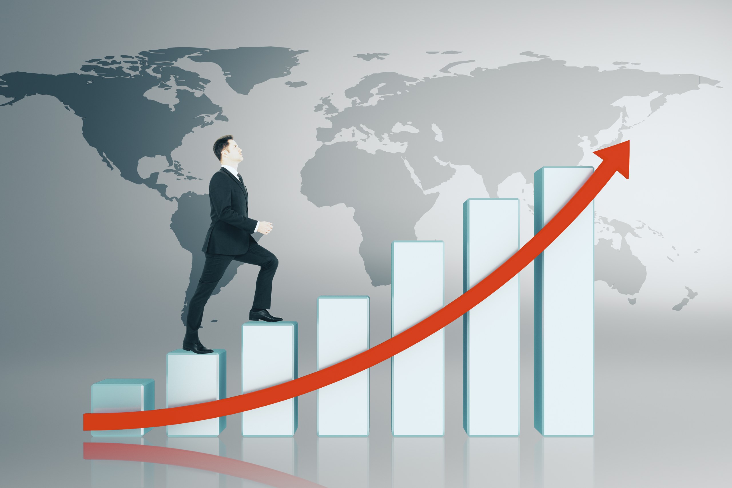 Man climbing bar graph toward global business succ