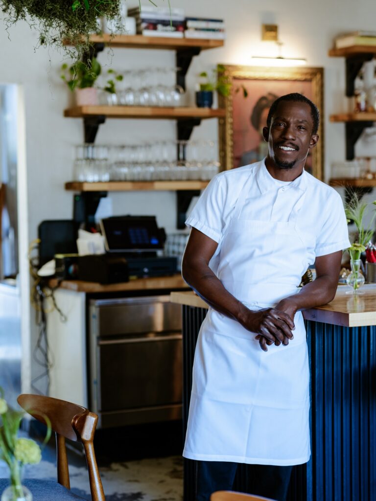 John Hall, executive chef and co-owner of Restaurant Lola, works alongside managing partner Anna Bressi.