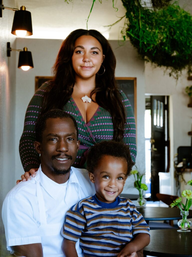 Restaurant Lola managing partner Anna Bressi with her fiancé, executive chef and co-owner John Hall, and their son, Luka.