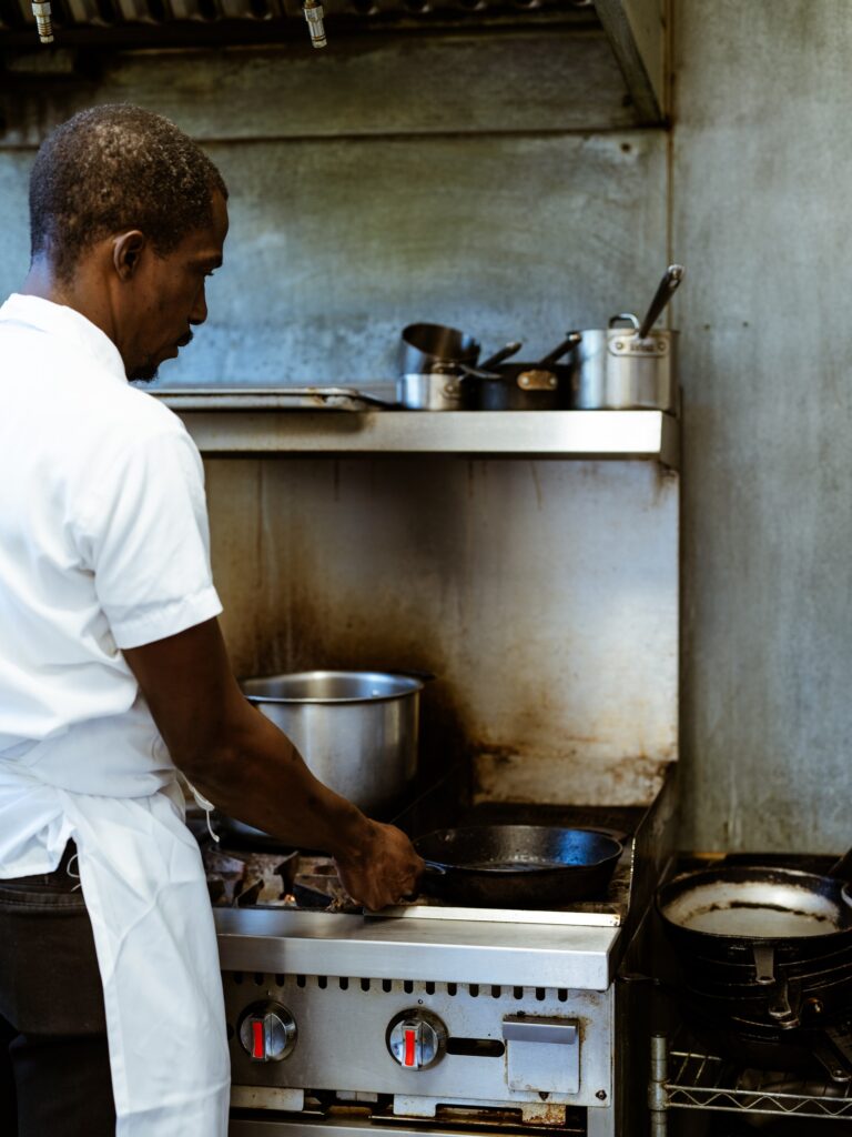 John Hall, executive chef and co-owner of Restaurant Lola, leads the restaurant’s kitchen.