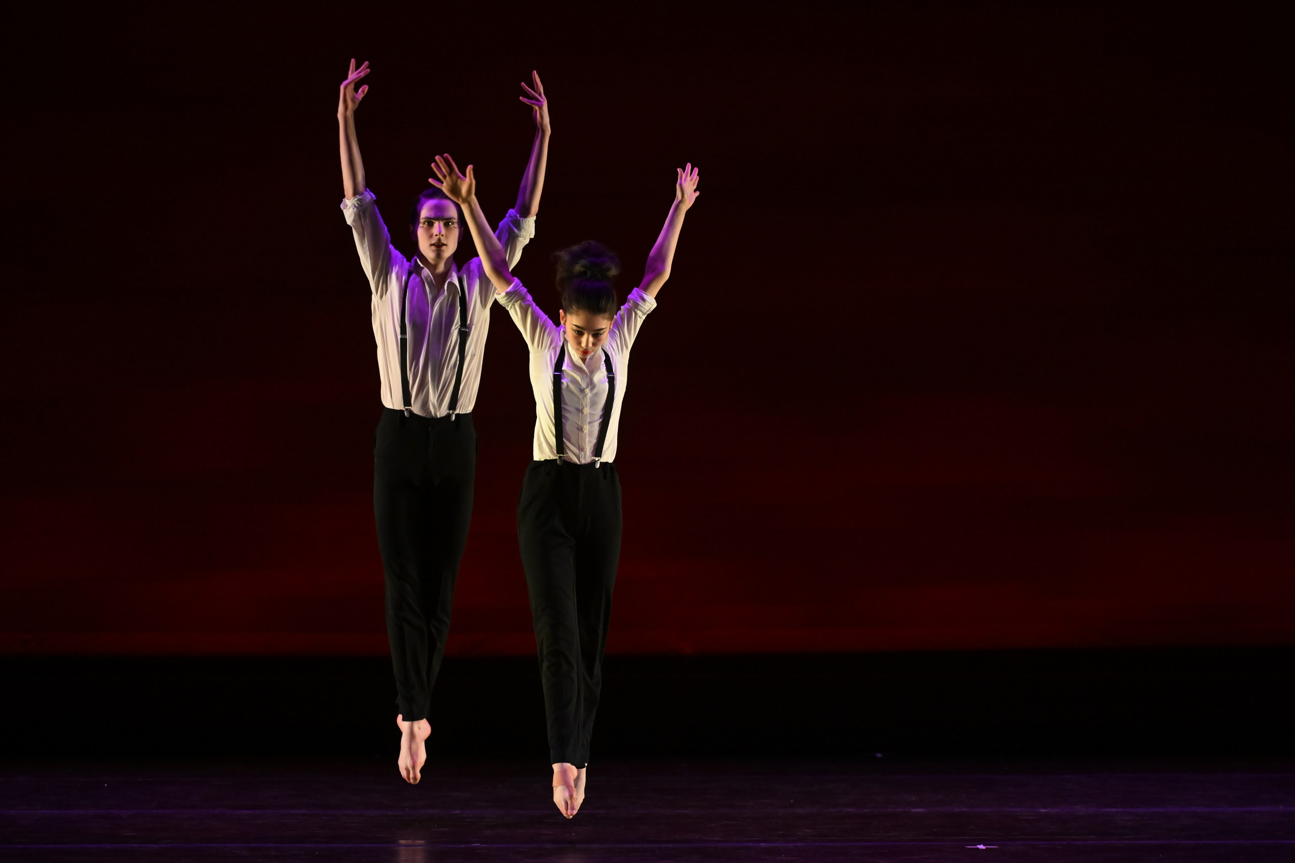 Peninsula Dance Theatre dancers perform onstage.
